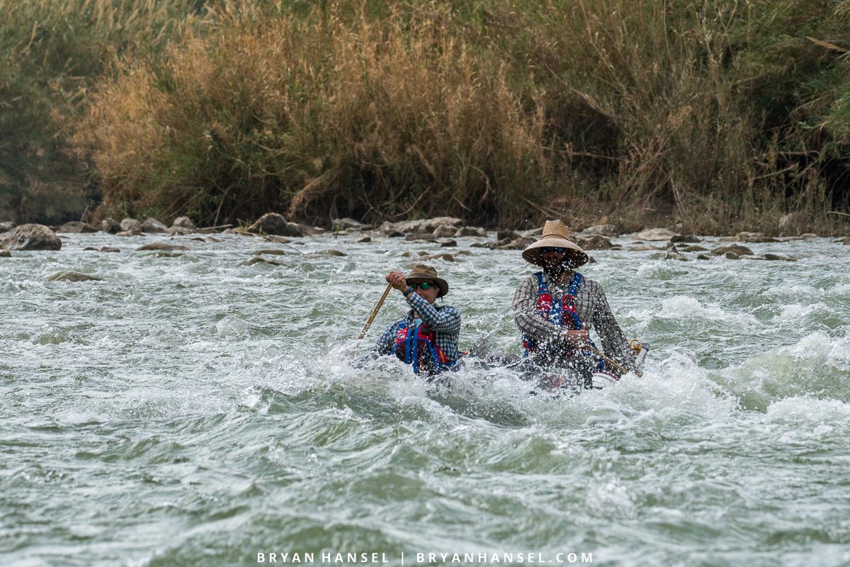 Dave and Amy Freeman paddling whitewater