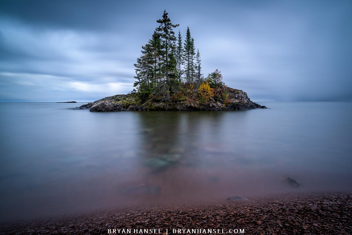 The Tombolo on Lake Superior surrounded by calm water.